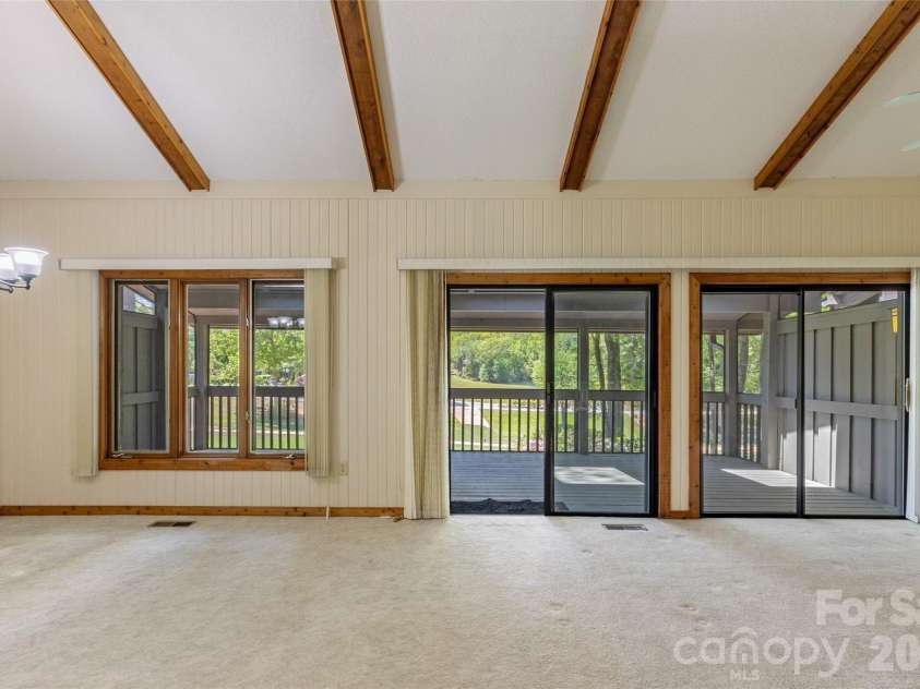 84 Fairway Villas Drive, Sapphire, NC 28774.  MLS# CAR4381824, YatesRealty ID 22026. 