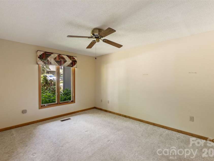 84 Fairway Villas Drive, Sapphire, NC 28774.  MLS# CAR4381824, YatesRealty ID 22026. 