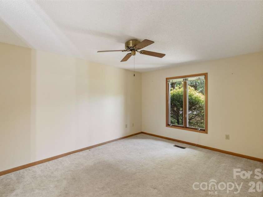 84 Fairway Villas Drive, Sapphire, NC 28774.  MLS# CAR4381824, YatesRealty ID 22026. 