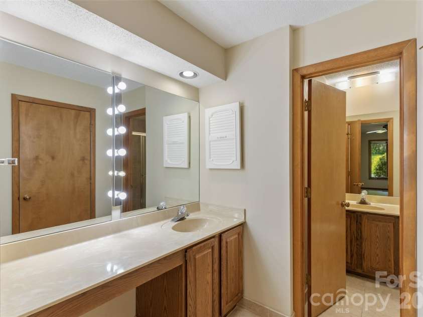 84 Fairway Villas Drive, Sapphire, NC 28774.  MLS# CAR4381824, YatesRealty ID 22026. 