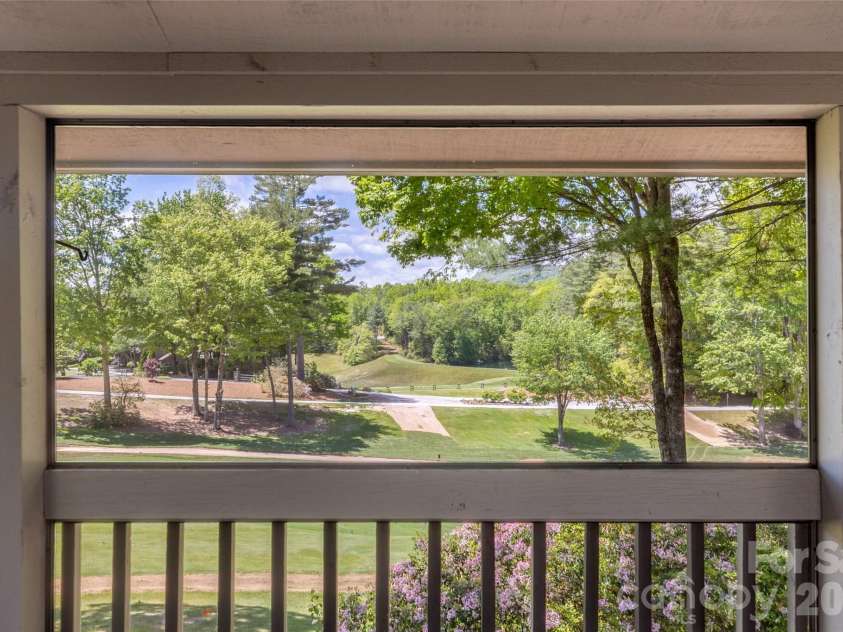 84 Fairway Villas Drive, Sapphire, NC 28774.  MLS# CAR4381824, YatesRealty ID 22026. 