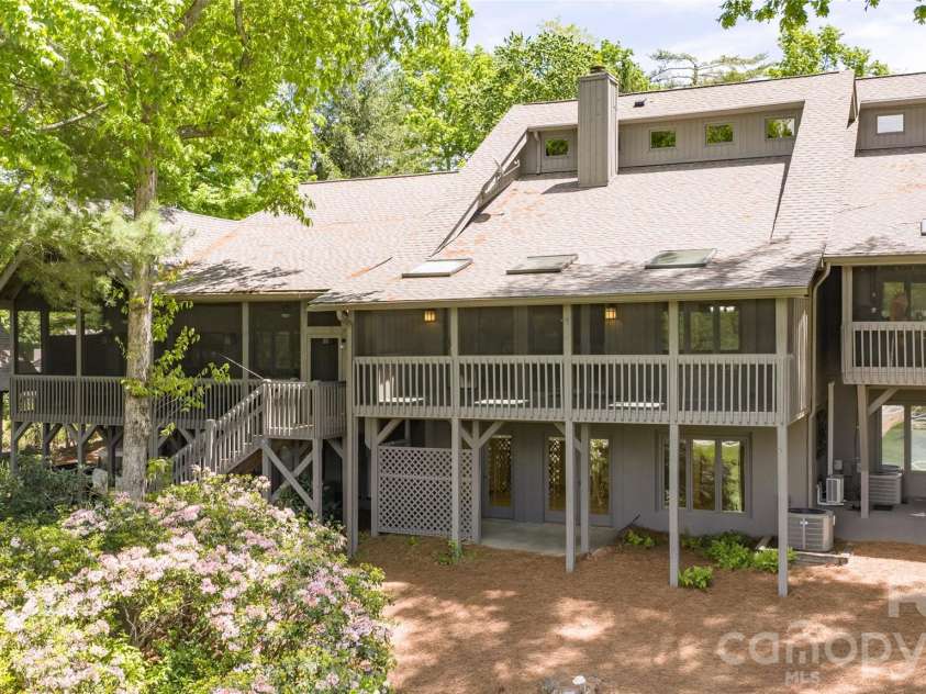 84 Fairway Villas Drive, Sapphire, NC 28774.  MLS# CAR4381824, YatesRealty ID 22026. 