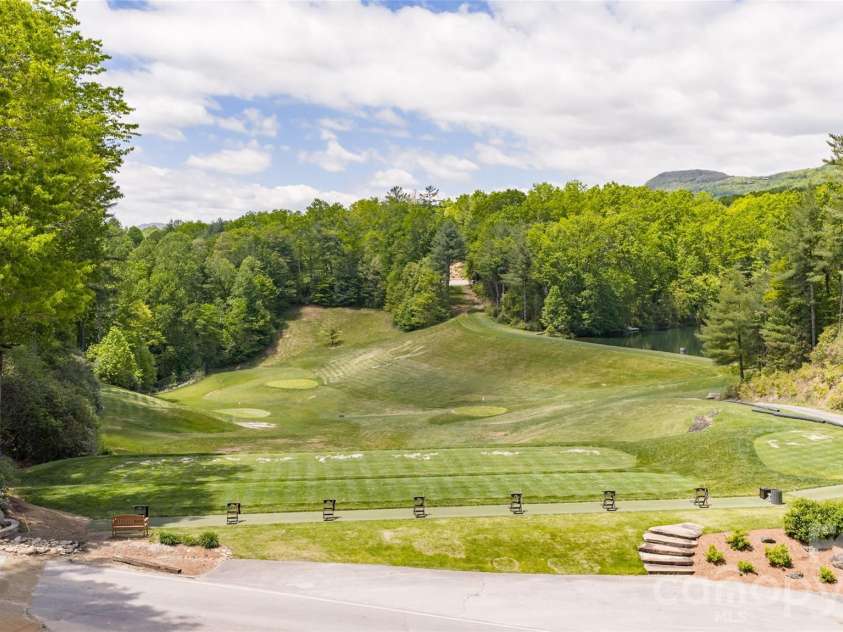84 Fairway Villas Drive, Sapphire, NC 28774.  MLS# CAR4381824, YatesRealty ID 22026. 