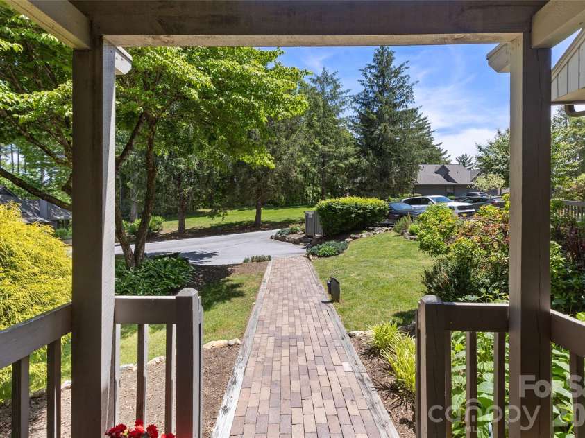84 Fairway Villas Drive, Sapphire, NC 28774.  MLS# CAR4381824, YatesRealty ID 22026. 