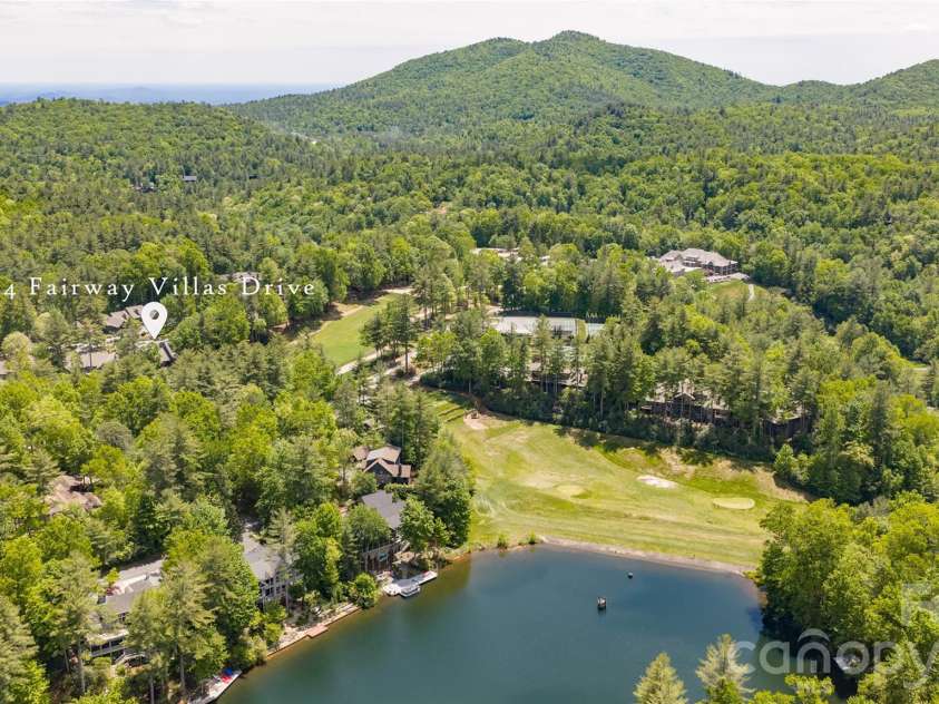 84 Fairway Villas Drive, Sapphire, NC 28774.  MLS# CAR4381824, YatesRealty ID 22026. 