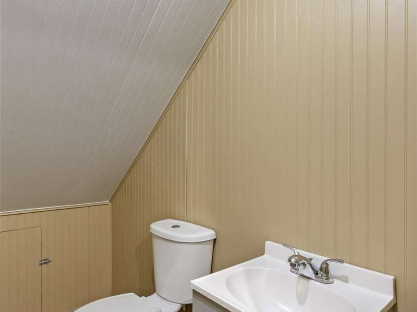 84 Fairway Villas Drive, Sapphire, NC 28774.  MLS# CAR4381824, YatesRealty ID 22026. Half bath in basement