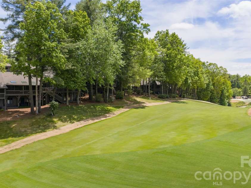 84 Fairway Villas Drive, Sapphire, NC 28774.  MLS# CAR4381824, YatesRealty ID 22026. Located on the 10th fairway.