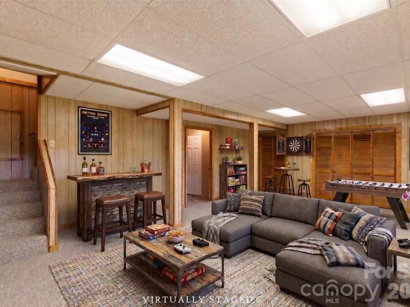 84 Fairway Villas Drive, Sapphire, NC 28774.  MLS# CAR4381824, YatesRealty ID 22026. Virtually staged basement