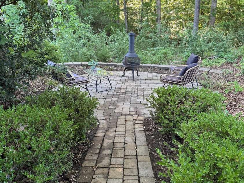 4066 Belle Meade Circle, Belmont, NC 28012.  MLS# CAR4255960, YatesRealty ID 22029. Enjoy the tranquility of the backyard amongst the trees.