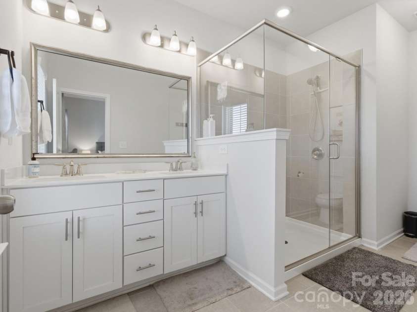 9812 Ainslie Downs Street, Charlotte, NC 28273.  MLS# CAR4375661, YatesRealty ID 22029. Primary Bathroom