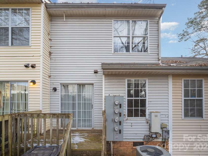 6303 Windsor Gate Lane, Charlotte, NC 28215.  MLS# CAR4214634, YatesRealty ID 2203. Rear exterior