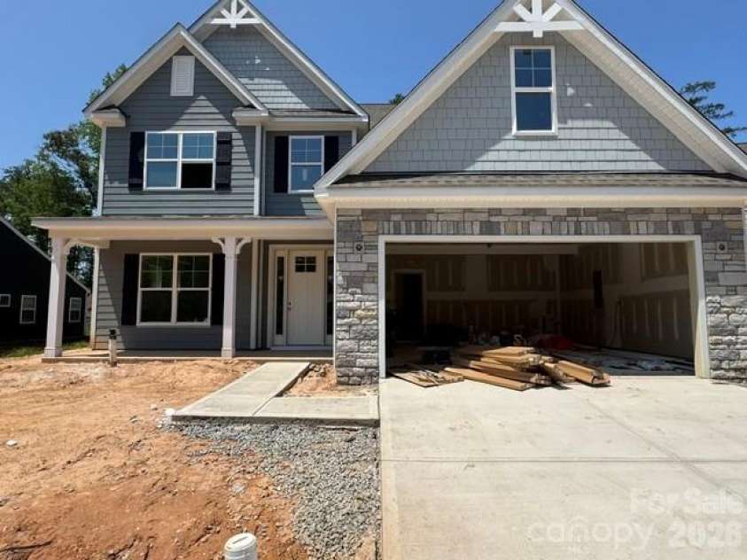 5068 McLaughlin Loop, Waxhaw, NC 28173.  MLS# CAR4375296, YatesRealty ID 22034. Homesite 92 features a McDowell B floorplan
