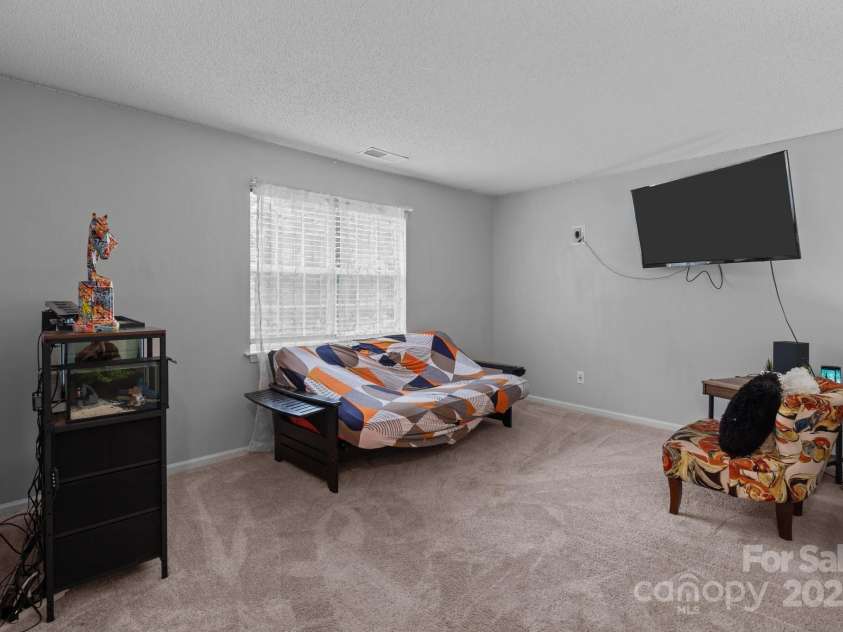 8906 Pickering Grove Lane, Charlotte, NC 28216.  MLS# CAR4291969, YatesRealty ID 22035. 