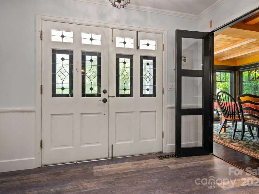64 Persimmon Hill Drive, Columbus, NC 28722.  MLS# CAR4257157, YatesRealty ID 22038. Entry way w/ dining room to the right