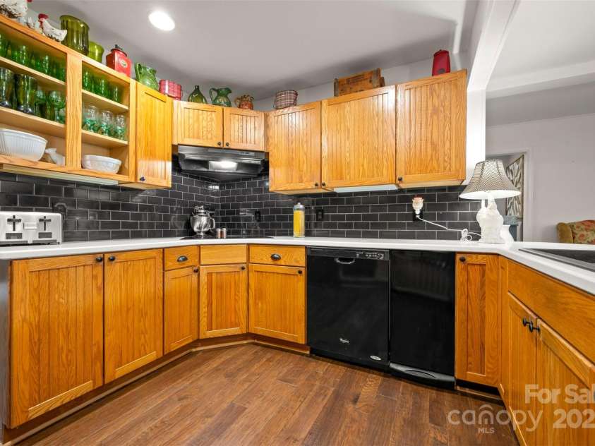 64 Persimmon Hill Drive, Columbus, NC 28722.  MLS# CAR4257157, YatesRealty ID 22038. Kitchen w/ ample storage