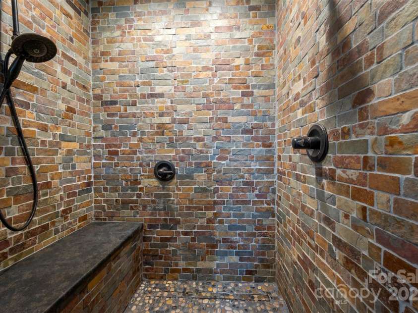 64 Persimmon Hill Drive, Columbus, NC 28722.  MLS# CAR4257157, YatesRealty ID 22038. Walk-in Shower w/ bench seat