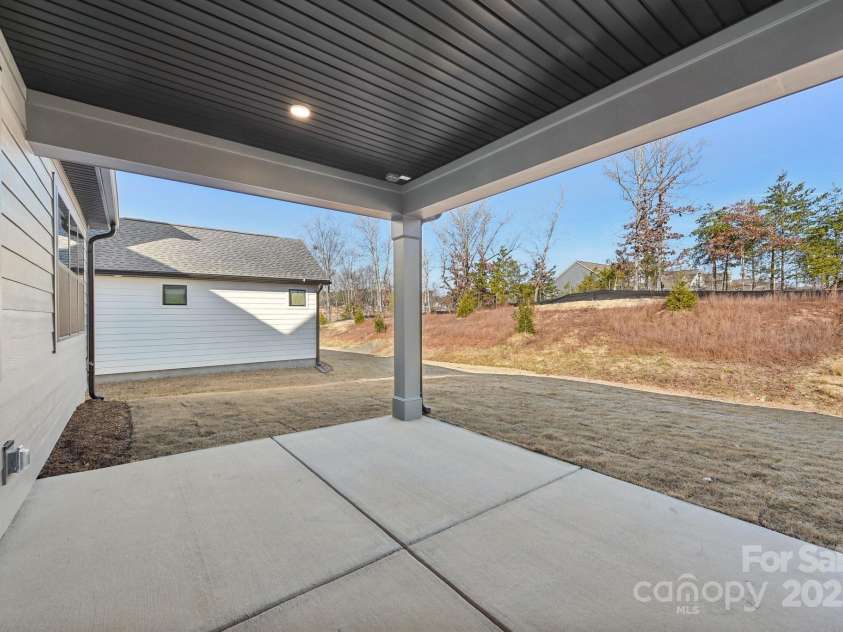 148 Windy Dell Drive, Tega Cay, SC 29708.  MLS# CAR4204504, YatesRealty ID 2204. Covered Patio