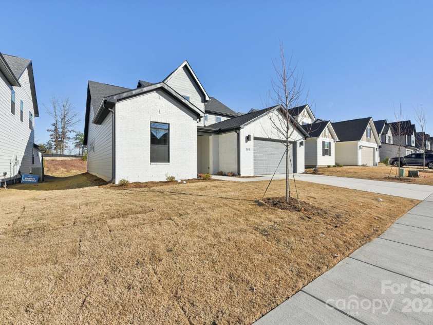 148 Windy Dell Drive, Tega Cay, SC 29708.  MLS# CAR4204504, YatesRealty ID 2204. Exterior of Home