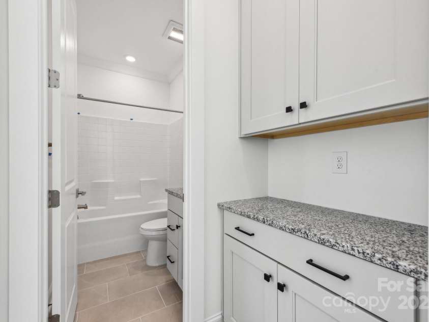 148 Windy Dell Drive, Tega Cay, SC 29708.  MLS# CAR4204504, YatesRealty ID 2204. Main floor guest bath
