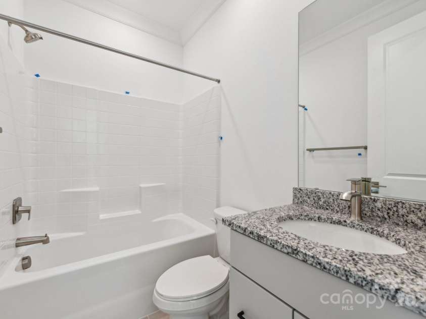 148 Windy Dell Drive, Tega Cay, SC 29708.  MLS# CAR4204504, YatesRealty ID 2204. Main Floor Guest Bath