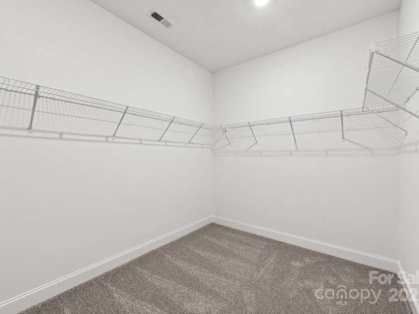 148 Windy Dell Drive, Tega Cay, SC 29708.  MLS# CAR4204504, YatesRealty ID 2204. Primary Closet