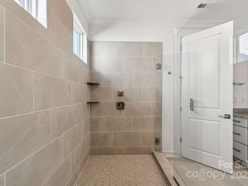 148 Windy Dell Drive, Tega Cay, SC 29708.  MLS# CAR4204504, YatesRealty ID 2204. Primary Shower
