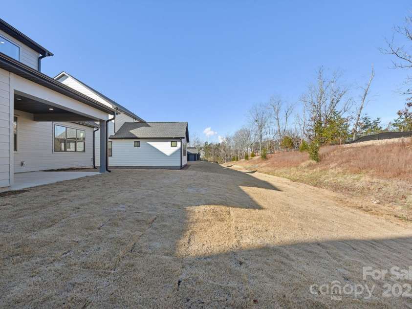 148 Windy Dell Drive, Tega Cay, SC 29708.  MLS# CAR4204504, YatesRealty ID 2204. Rear Yard