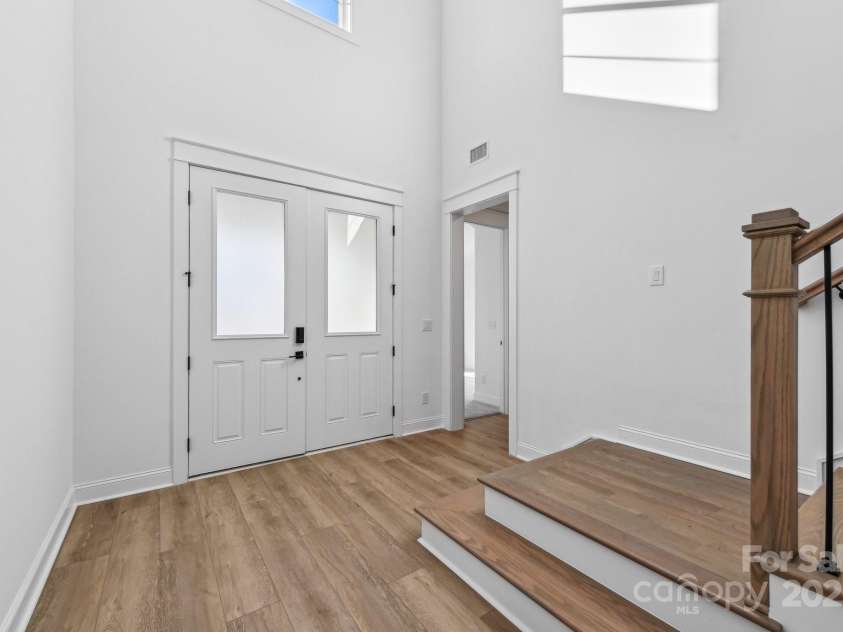 148 Windy Dell Drive, Tega Cay, SC 29708.  MLS# CAR4204504, YatesRealty ID 2204. Two-Story Foyer