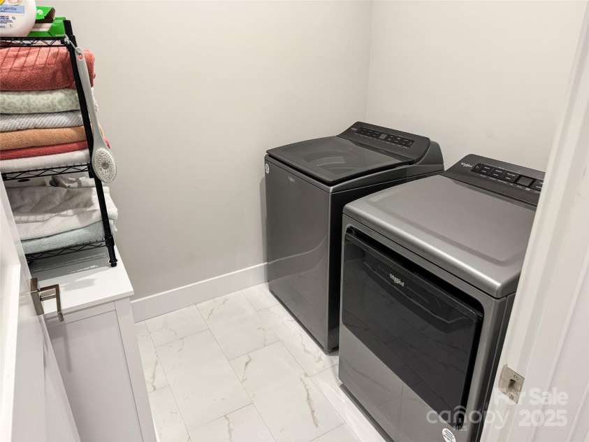 154 Amblers Knoll Road, Weaverville, NC 28787.  MLS# CAR4296744, YatesRealty ID 22044. Laundry on lower level