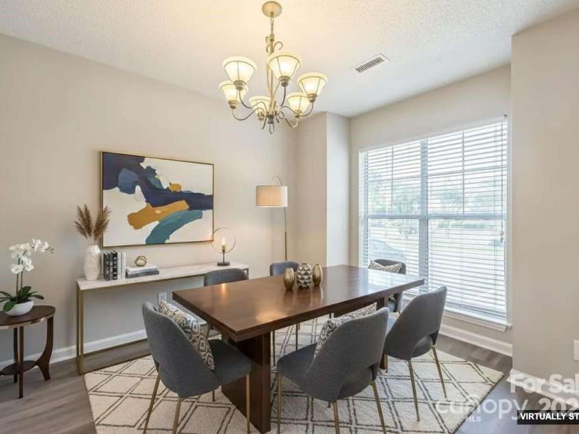 17431 Tuscany Lane, Cornelius, NC 28031.  MLS# CAR4272673, YatesRealty ID 22048. Dining room virtual staged