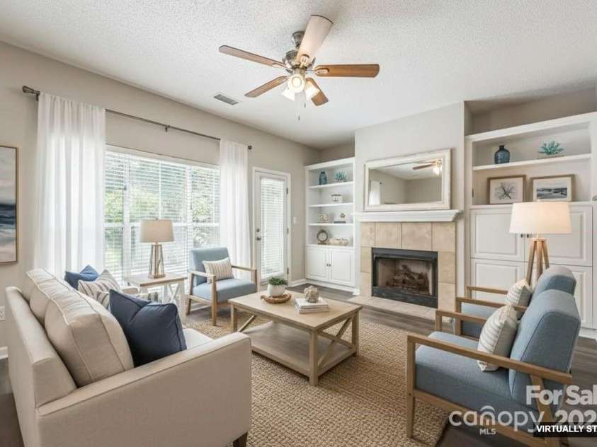 17431 Tuscany Lane, Cornelius, NC 28031.  MLS# CAR4272673, YatesRealty ID 22048. Living room- virtually staged
