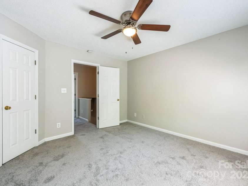 17431 Tuscany Lane, Cornelius, NC 28031.  MLS# CAR4272673, YatesRealty ID 22048. Primary bedroom