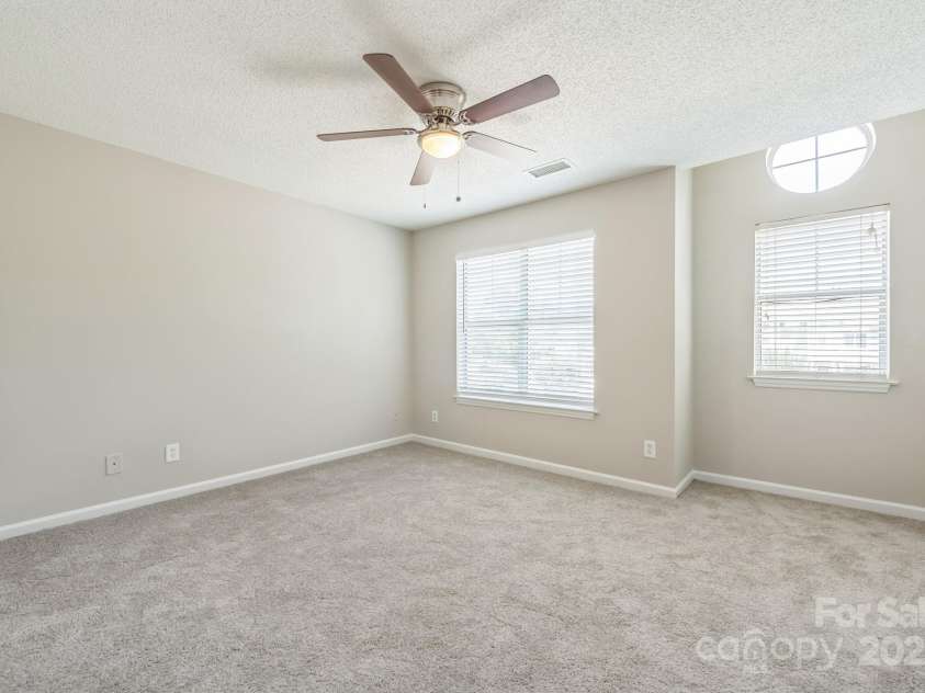 17431 Tuscany Lane, Cornelius, NC 28031.  MLS# CAR4272673, YatesRealty ID 22048. Secondary bedroom