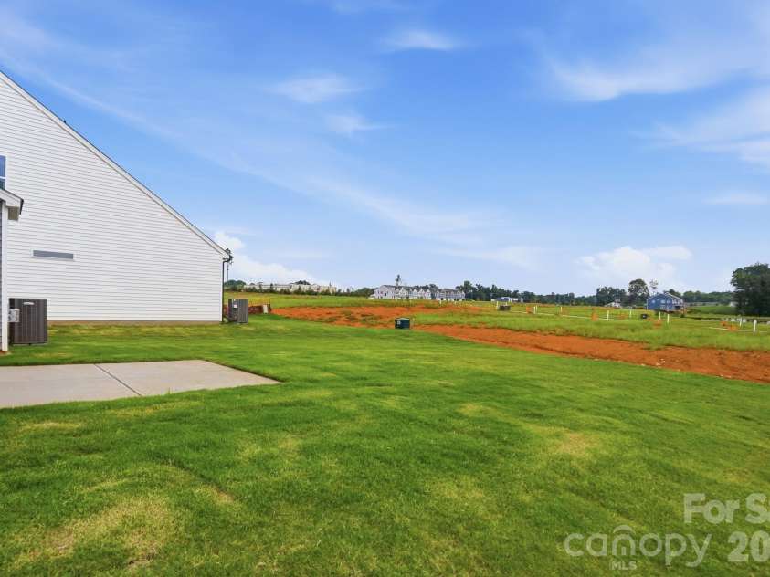 120 Swing Lane, Troutman, NC 28166.  MLS# CAR4382366, YatesRealty ID 22049. Backyard