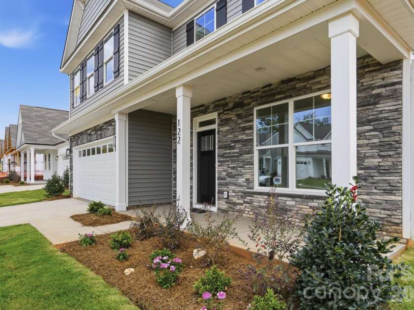 120 Swing Lane, Troutman, NC 28166.  MLS# CAR4382366, YatesRealty ID 22049. Front porch