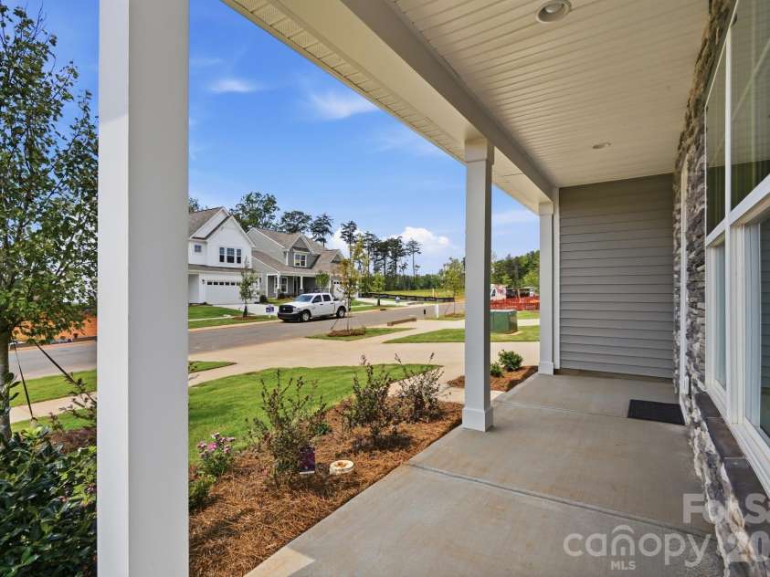 120 Swing Lane, Troutman, NC 28166.  MLS# CAR4382366, YatesRealty ID 22049. Front porch