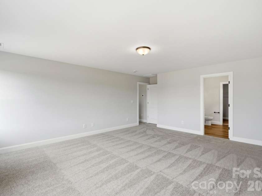 120 Swing Lane, Troutman, NC 28166.  MLS# CAR4382366, YatesRealty ID 22049. Primary Bedroom