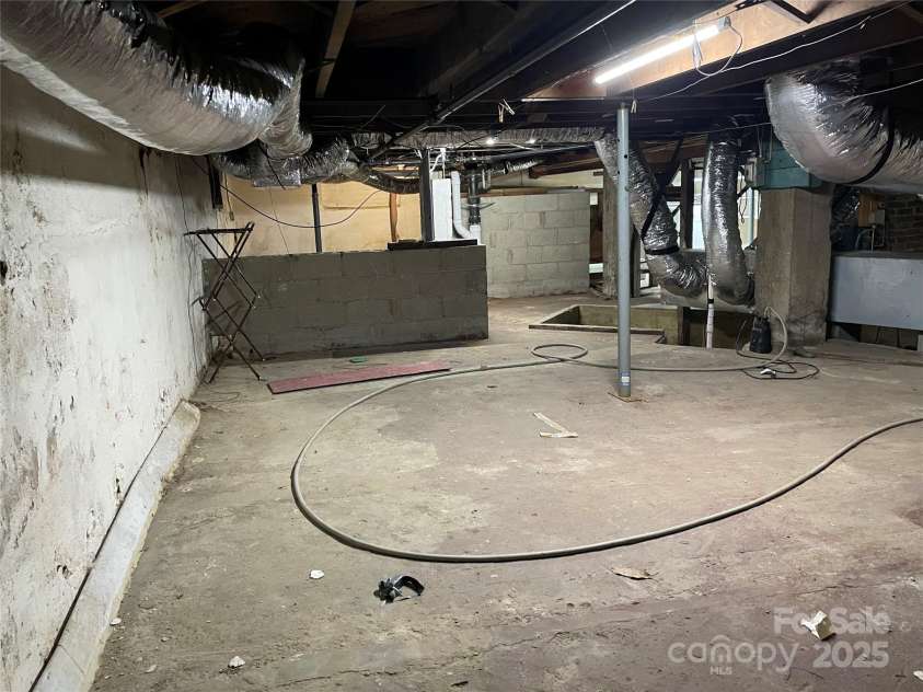 318 Academy Street, Canton, NC 28716.  MLS# CAR4263359, YatesRealty ID 2205. Basement