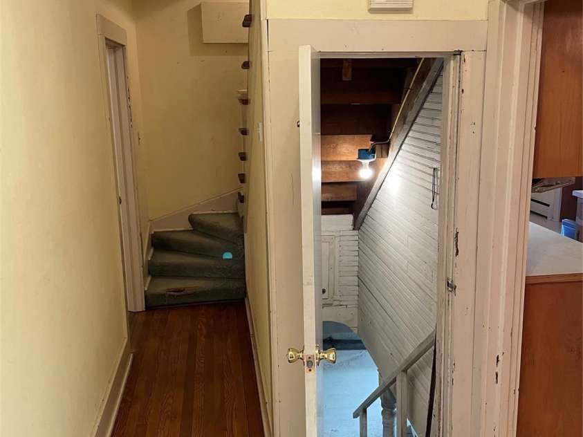 318 Academy Street, Canton, NC 28716.  MLS# CAR4263359, YatesRealty ID 2205. Basement stairs