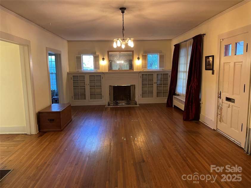 318 Academy Street, Canton, NC 28716.  MLS# CAR4263359, YatesRealty ID 2205. Formal living room has narrow 1.5