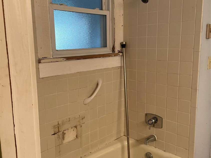 318 Academy Street, Canton, NC 28716.  MLS# CAR4263359, YatesRealty ID 2205. Main level bathroom