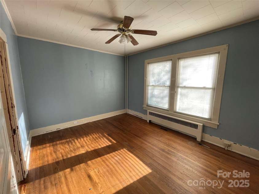 318 Academy Street, Canton, NC 28716.  MLS# CAR4263359, YatesRealty ID 2205. Main level bedroom