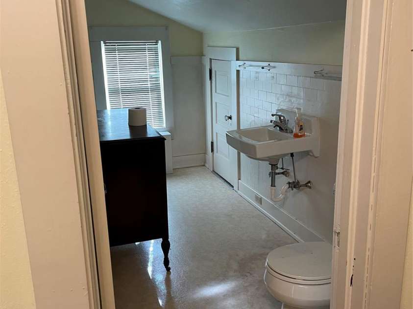 318 Academy Street, Canton, NC 28716.  MLS# CAR4263359, YatesRealty ID 2205. Upstairs half bath