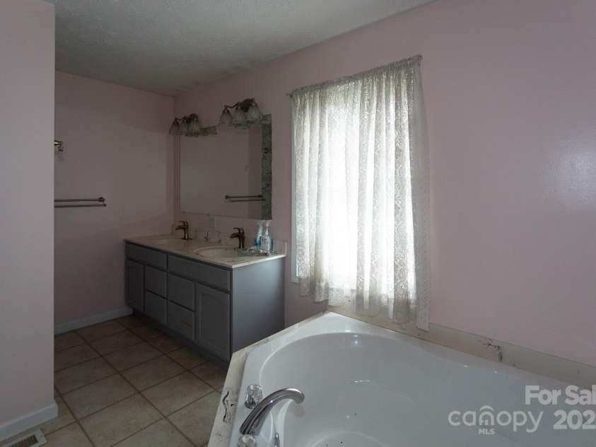 293 Gap Creek Road, Fletcher, NC 28732.  MLS# CAR4244795, YatesRealty ID 22055. 