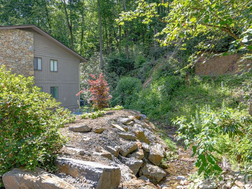 55 Lake Drive, Laurel Park, NC 28739.  MLS# CAR4395165, YatesRealty ID 2206. Recent stream restoration