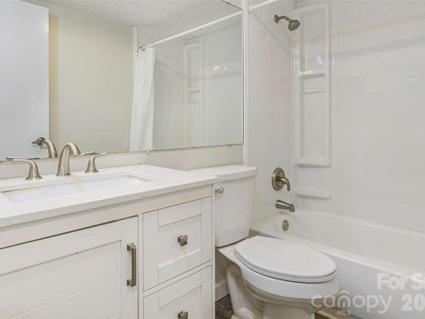 55 Lake Drive, Laurel Park, NC 28739.  MLS# CAR4395165, YatesRealty ID 2206. Second bathroom