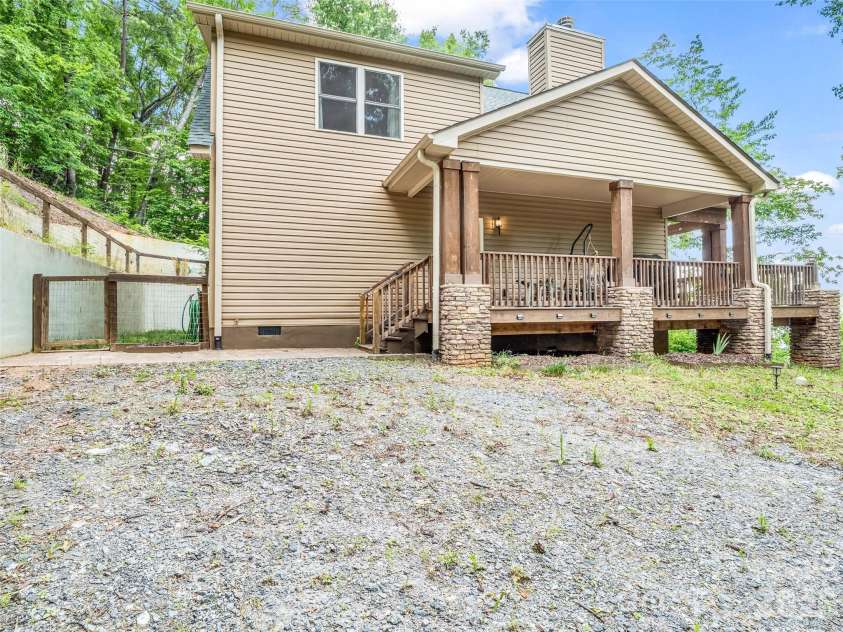 227 Snug Harbor Circle, Lake Lure, NC 28746.  MLS# CAR4380922, YatesRealty ID 22064. Driveway and side porch