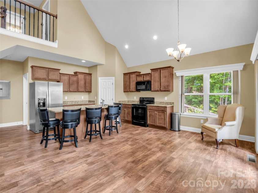 227 Snug Harbor Circle, Lake Lure, NC 28746.  MLS# CAR4380922, YatesRealty ID 22064. Kitchen and dining area