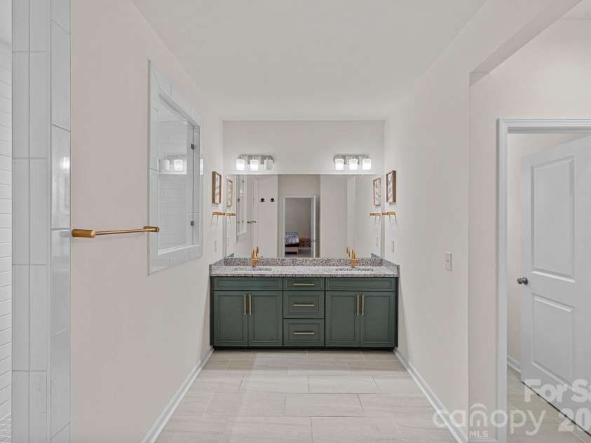 4184 Charlton Road, Fort Mill, SC 29715.  MLS# CAR4381943, YatesRealty ID 22069. Primary bathroom upper level