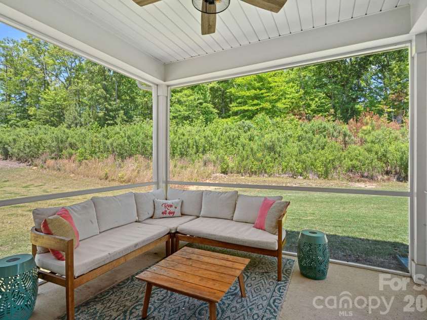 4184 Charlton Road, Fort Mill, SC 29715.  MLS# CAR4381943, YatesRealty ID 22069. Screened in backyard patio